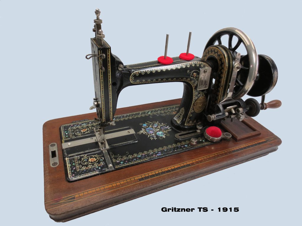 Ca 1915 Gritzner transverse shuttle hand crank sewing machine with intricate decals and mother of pearl